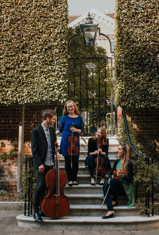 Consone Quartet 2 Three women and a man with string instruments